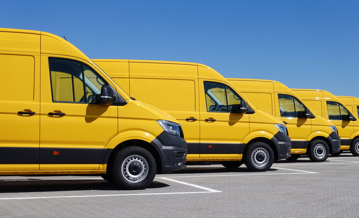 yellow delivery van fleet